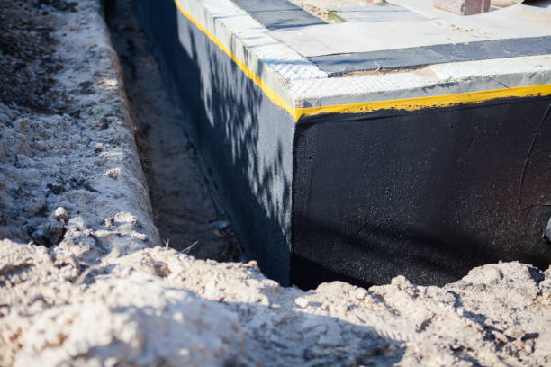 Professional Waterproofing technician working in Monroe, OH